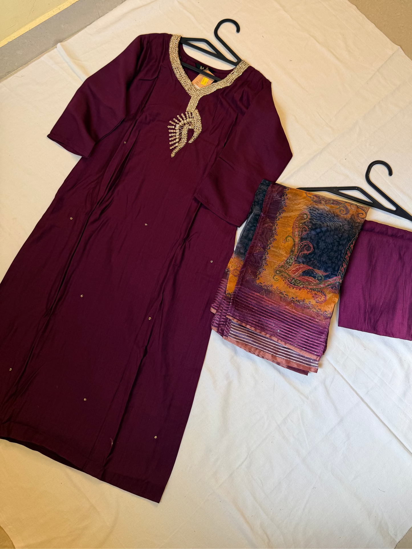 Purple traditional outfit with a patterned Dupatta
