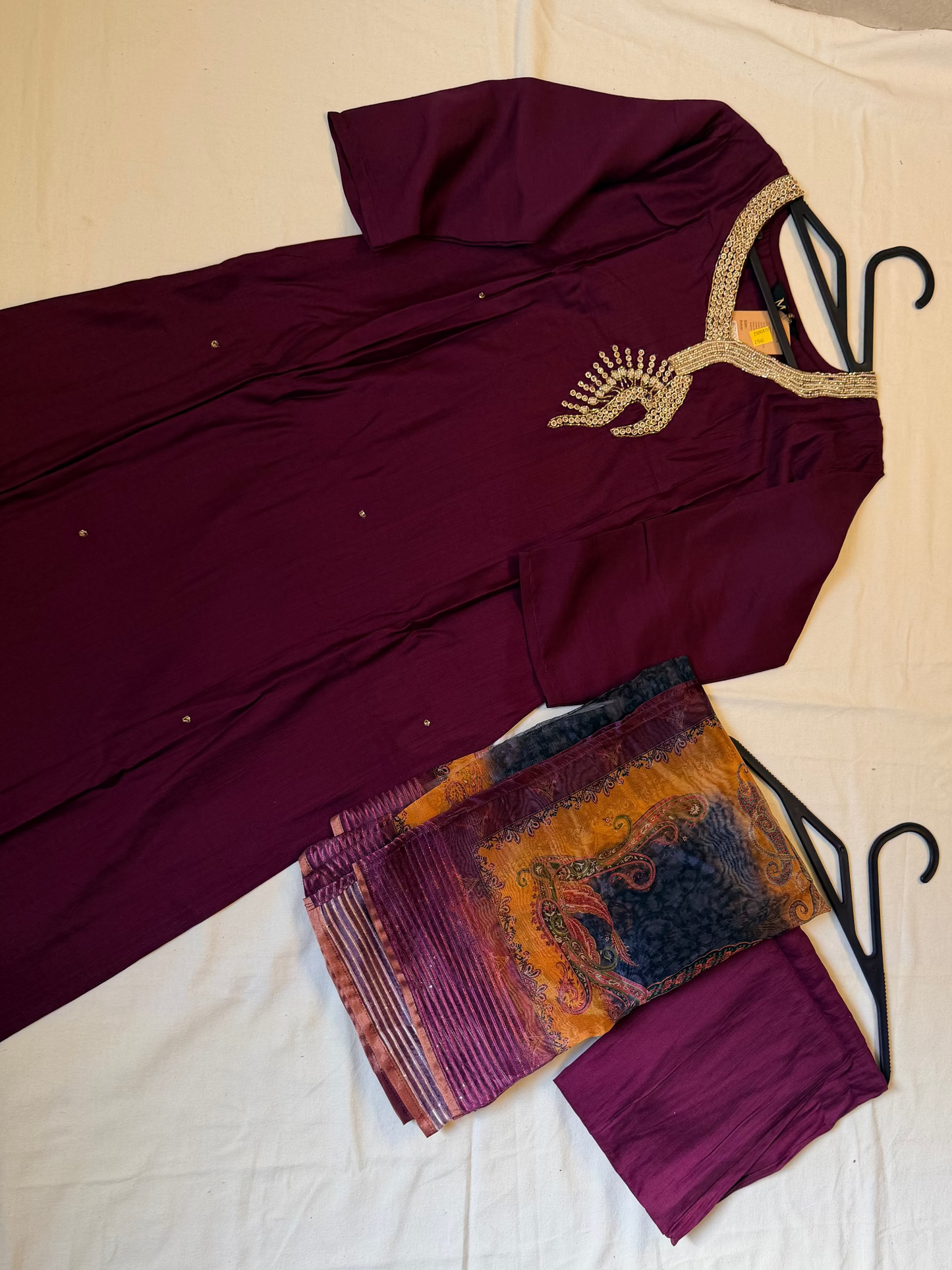 Purple traditional outfit with a patterned Dupatta