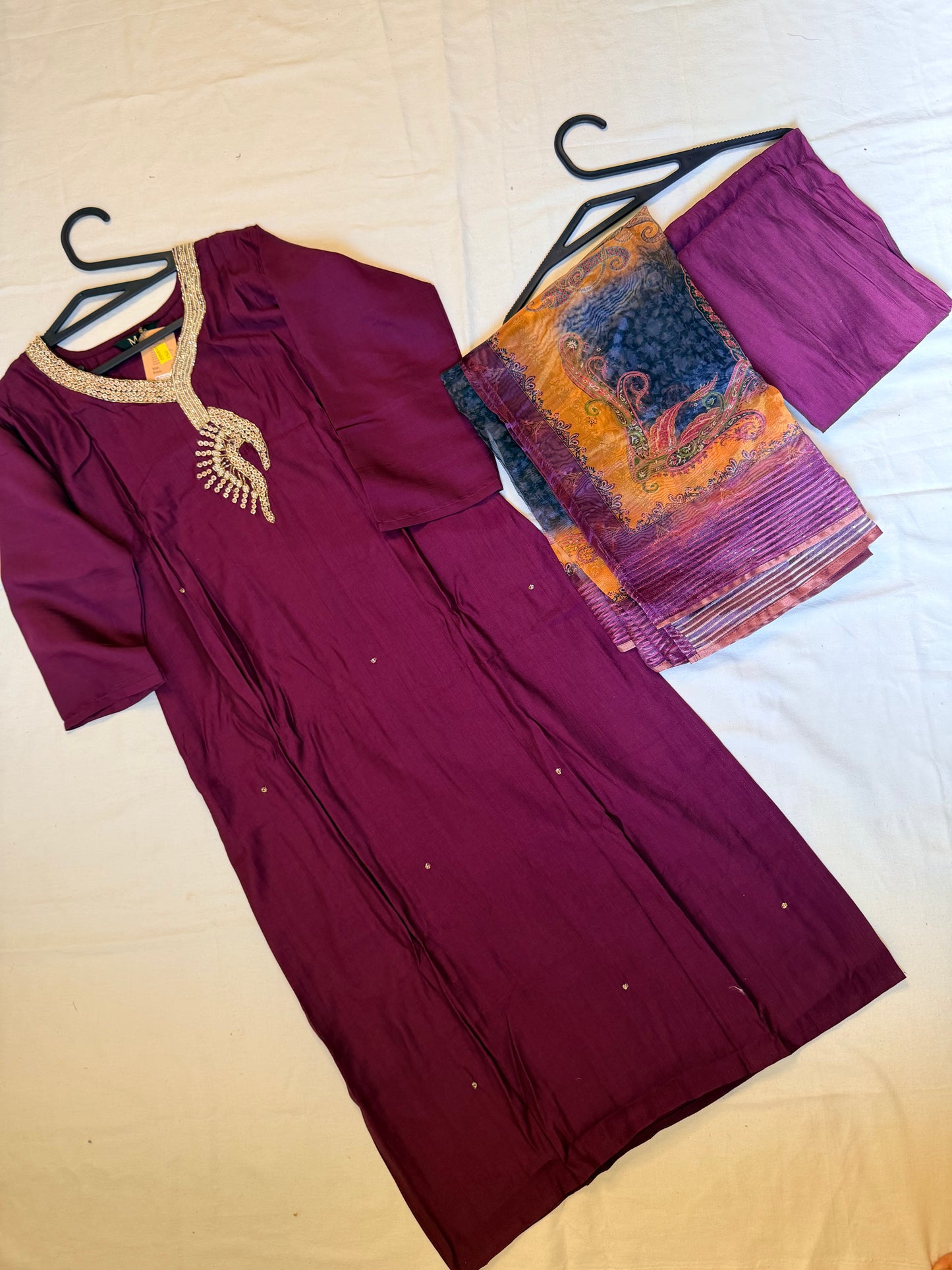 Purple traditional outfit with a patterned Dupatta