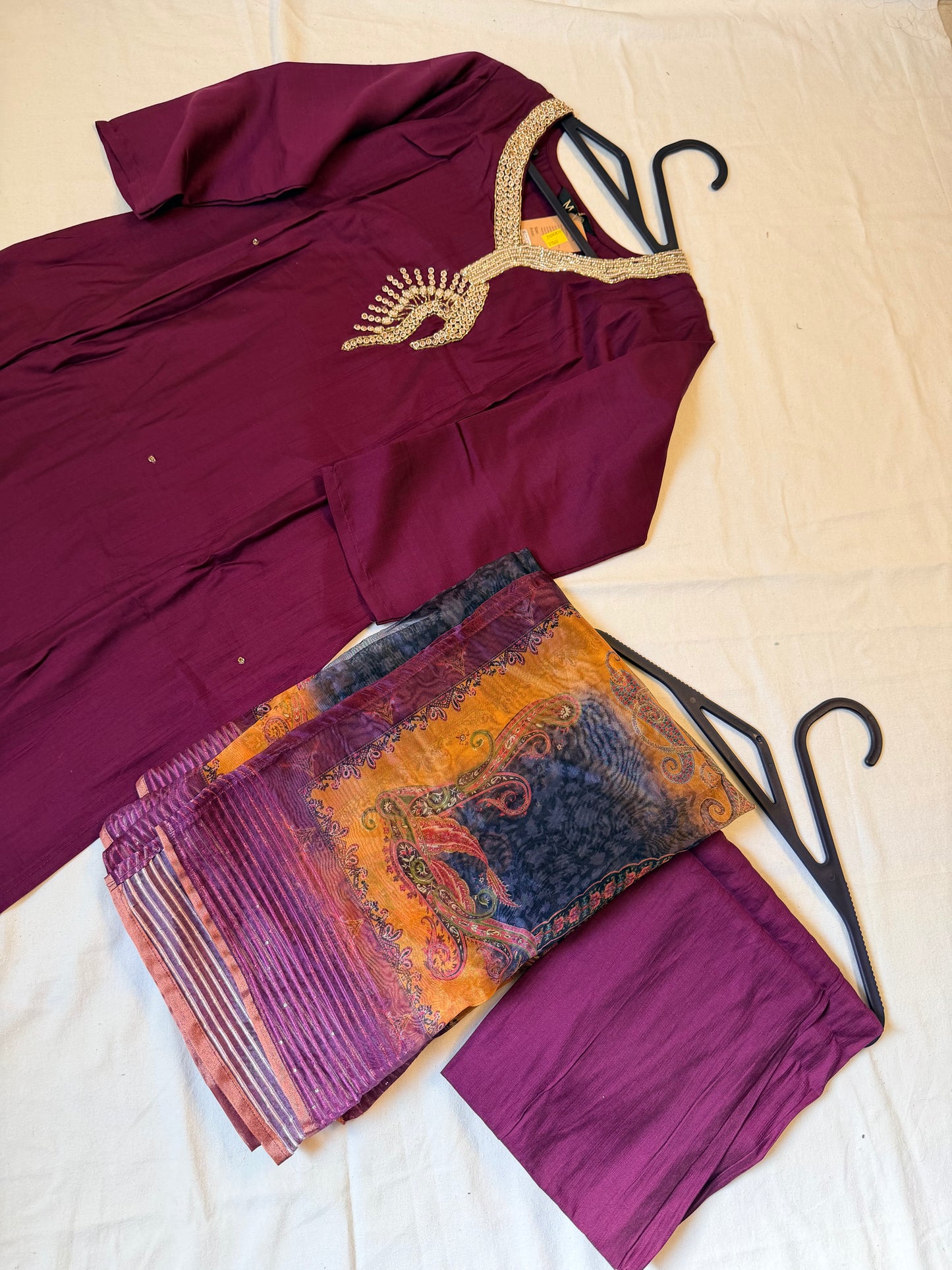 Purple traditional outfit with a patterned Dupatta