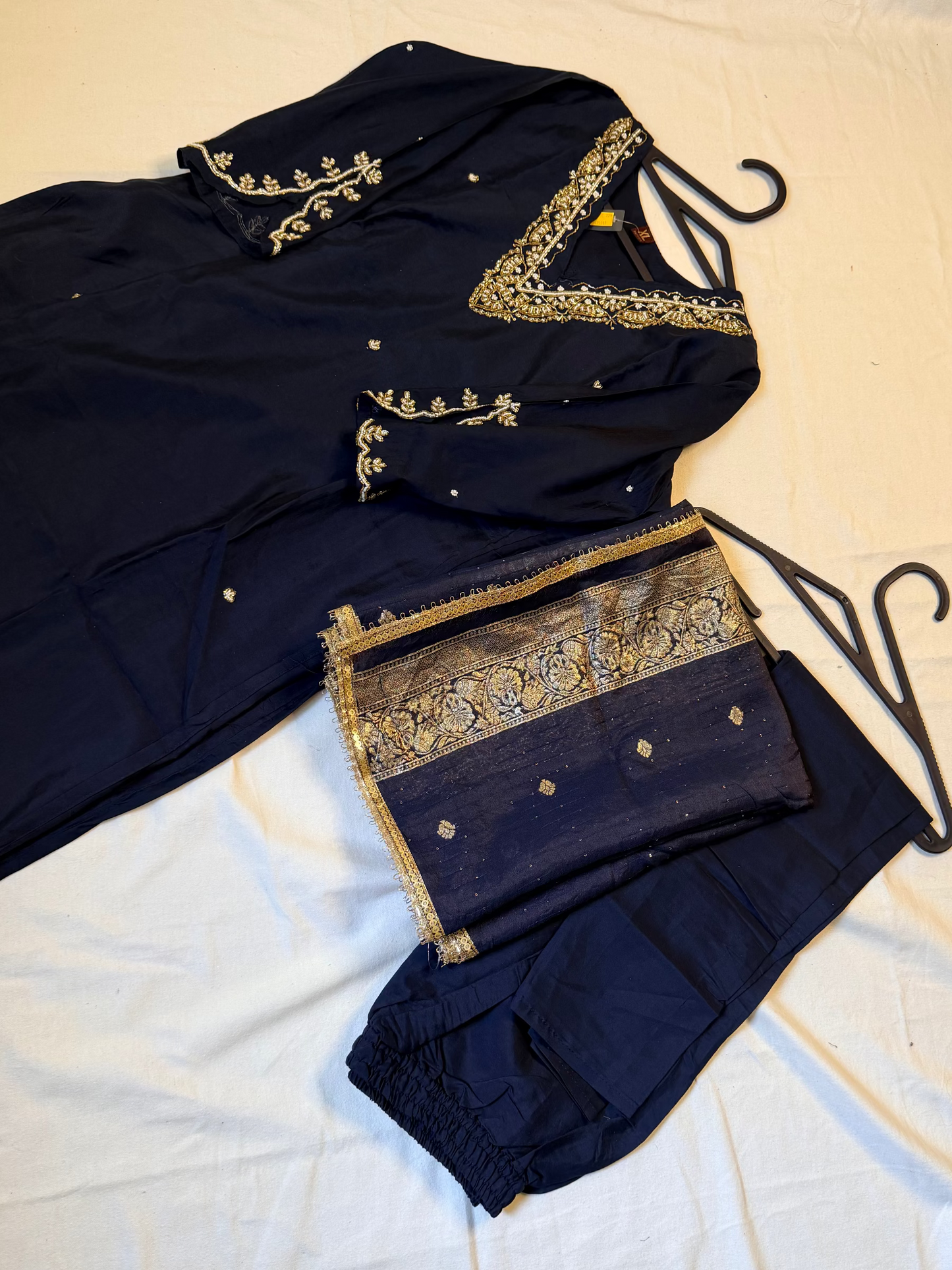 Navy blue outfit with embellishments