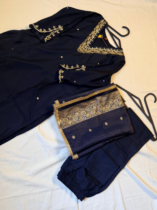 Navy blue outfit with embellishments