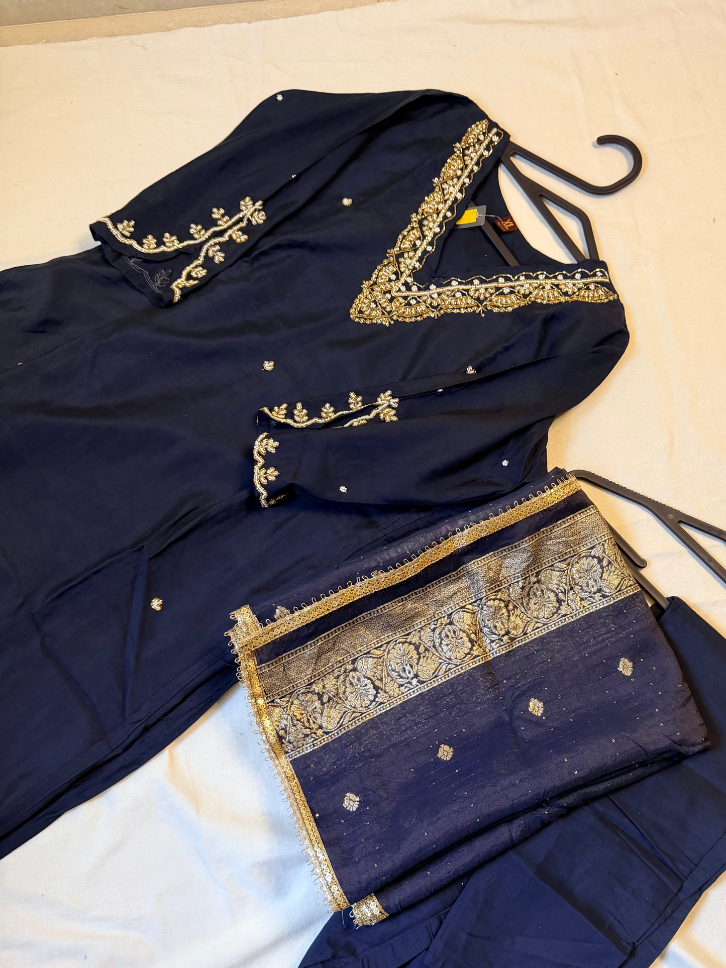 Navy blue outfit with embellishments