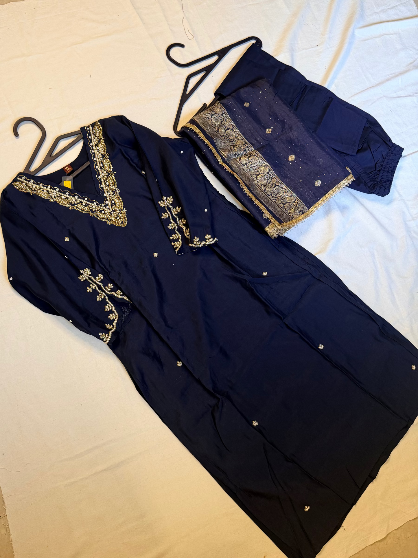 Navy blue outfit with embellishments