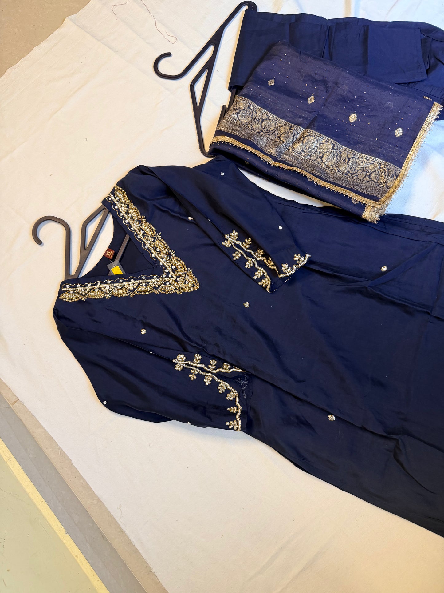 Navy blue outfit with embellishments