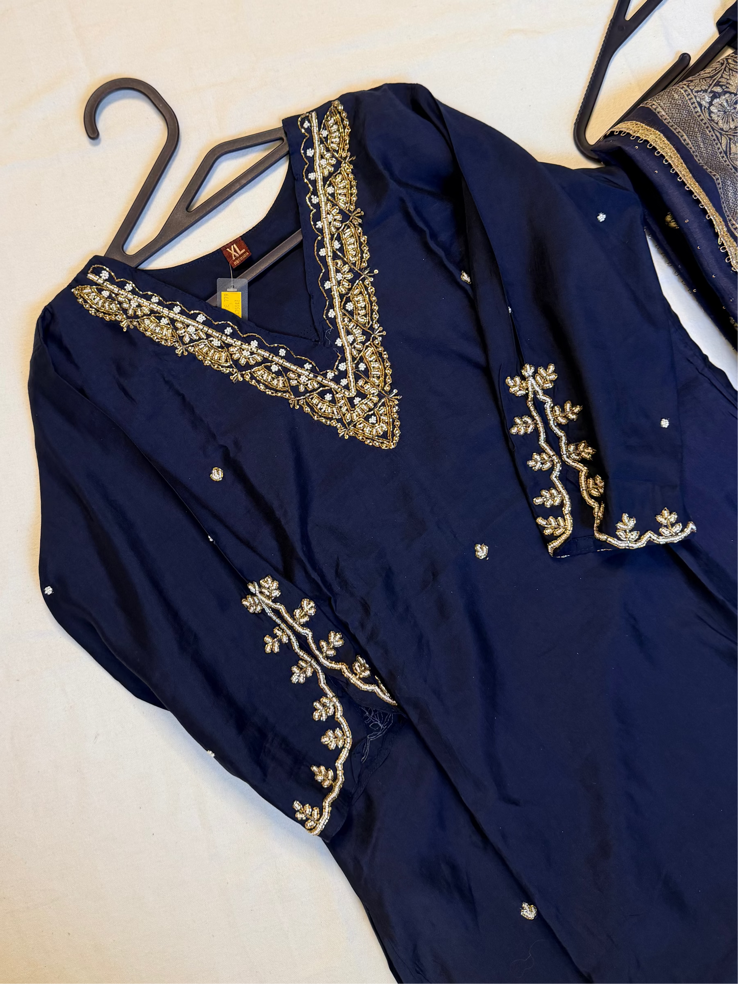 Navy blue outfit with embellishments