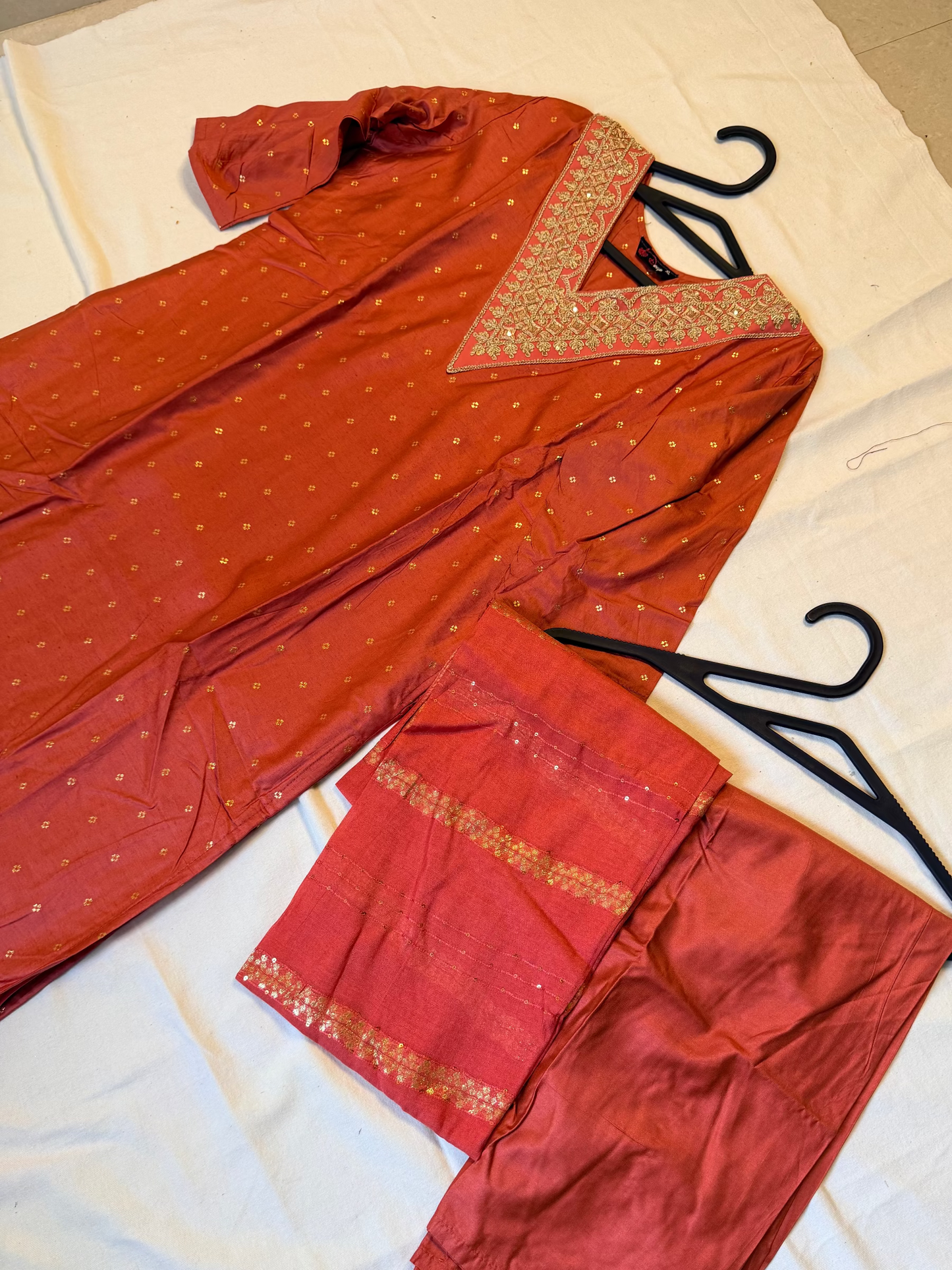 Peach traditional outfit with gold embroidery