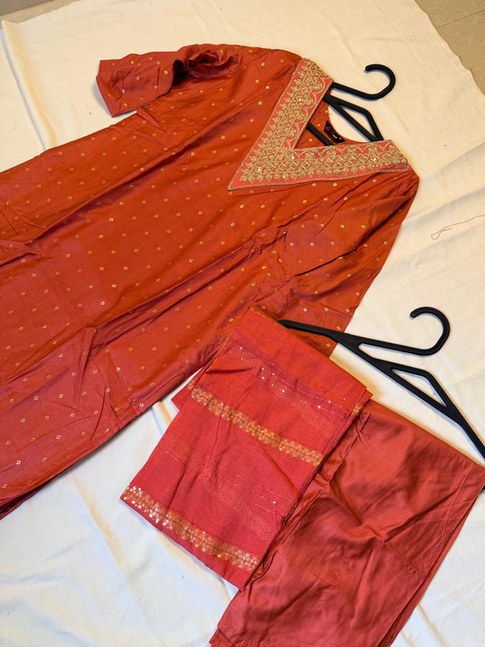 Peach traditional outfit with gold embroidery