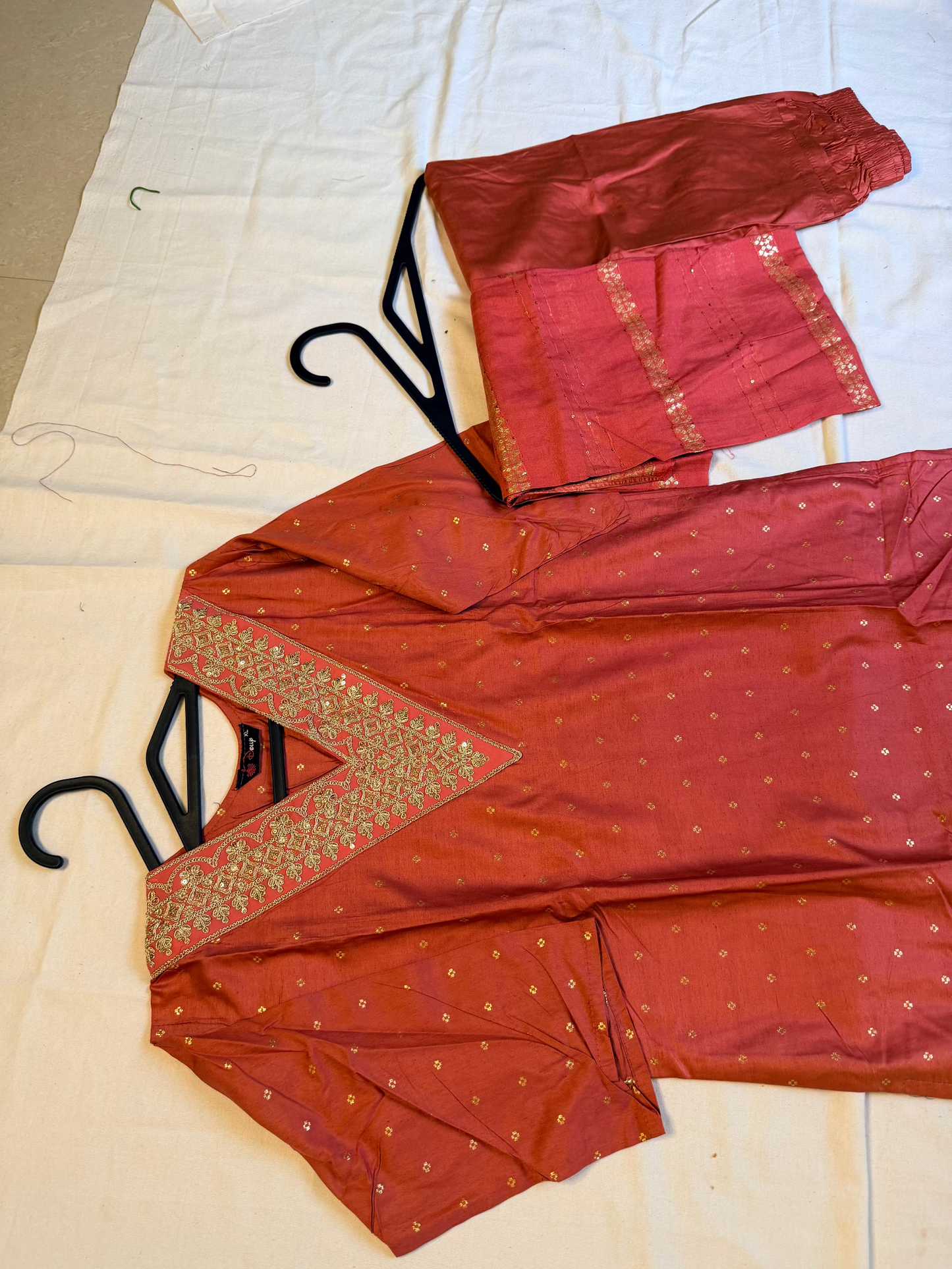 Peach traditional outfit with gold embroidery