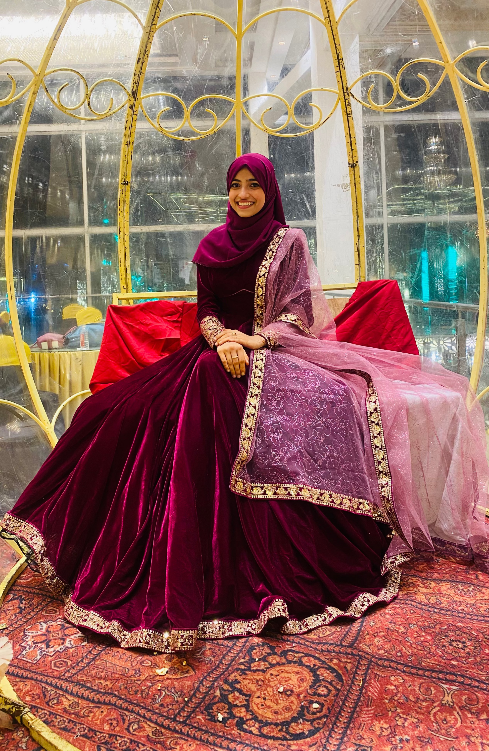 Maroon velvet dress with a sheer pink dupatta